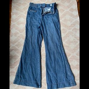 High rise bell bottom jeans with braided waistline and pockets